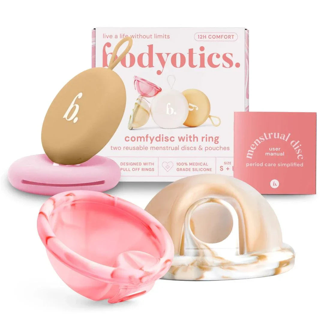 Bodyotics reusable menstrual discs in pink and beige with carry pouches and user manual for up to 12 hours leak-free period protection