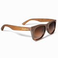 Wooden sunglasses with 'cloudfield' branding on a white background