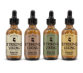 Beard Oil Variety 4 Pack Set featuring Vanilla, Sandalwood, Cedarwood, and Citrus scents in dropper bottles.