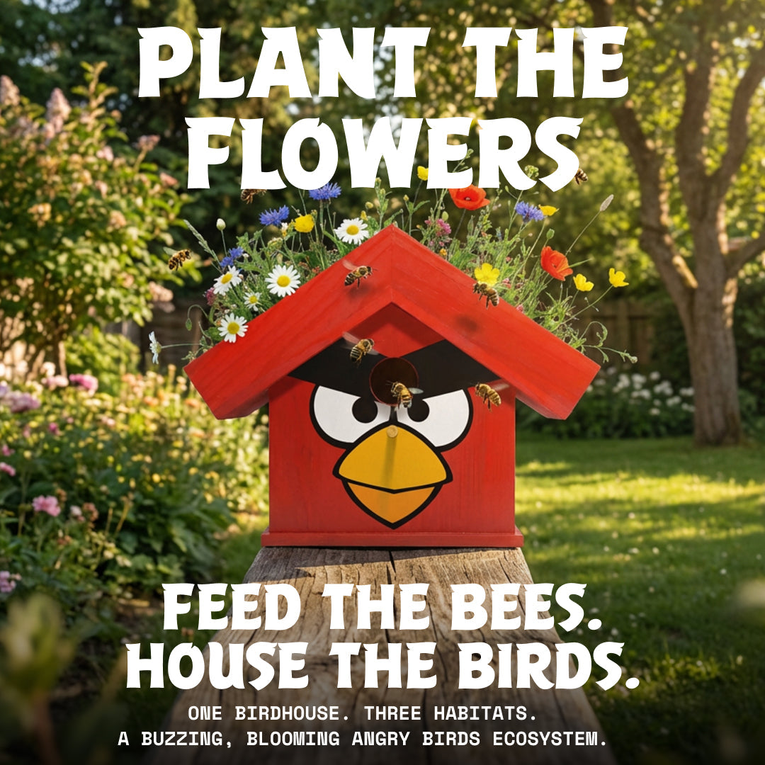 WildYard X Angry Birds™ Flowerpot Birdhouse mounted on a garden post surrounded by wildflowers
