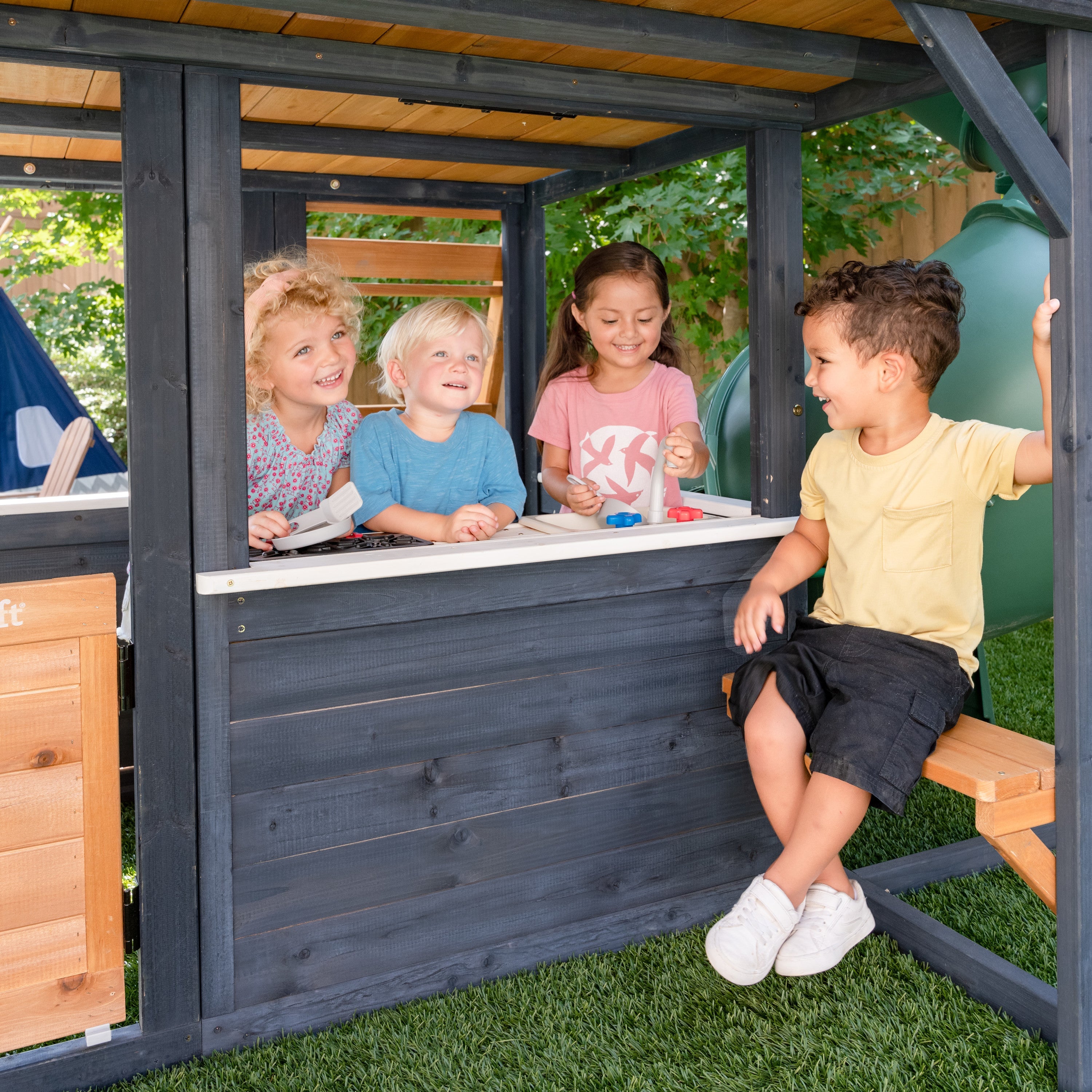 KidKraft Wooden Playhouse with Tube Slide – 2 Storey Outdoor Playground for Kids, Climbing Frame with Turbo Tube Slide & Rock Wall, Garden Play Tower